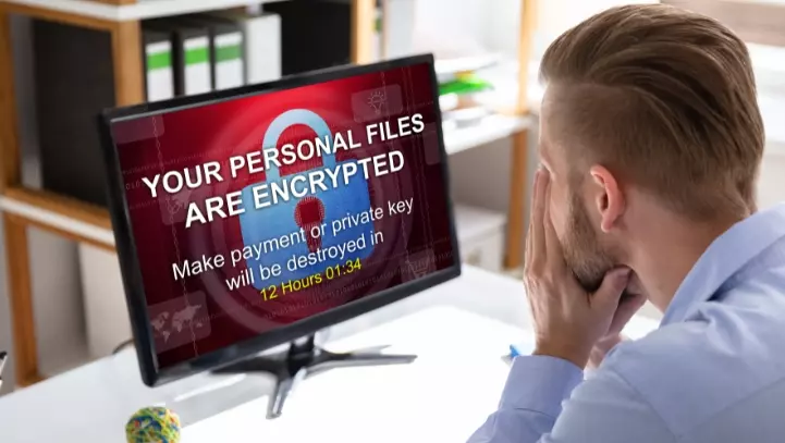 Computer screen with your files are encrypted on it