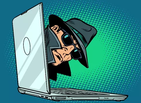 Cartoon of a spy peeking out of a laptop