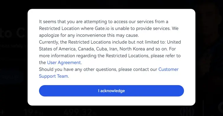 Gate.io geoblocking error message showing restricted access from US with an "I acknowledge" button